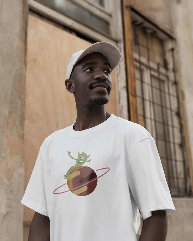 Person wearing Bright Lights album t-shirt featuring planet and monster illustration from the vinyl cover