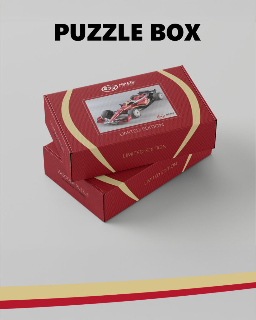Limited edition red cardboard puzzle box for the Mirazu F1 Team with the puzzle artwork displayed on the packaging and labeled “PUZZLE BOX”